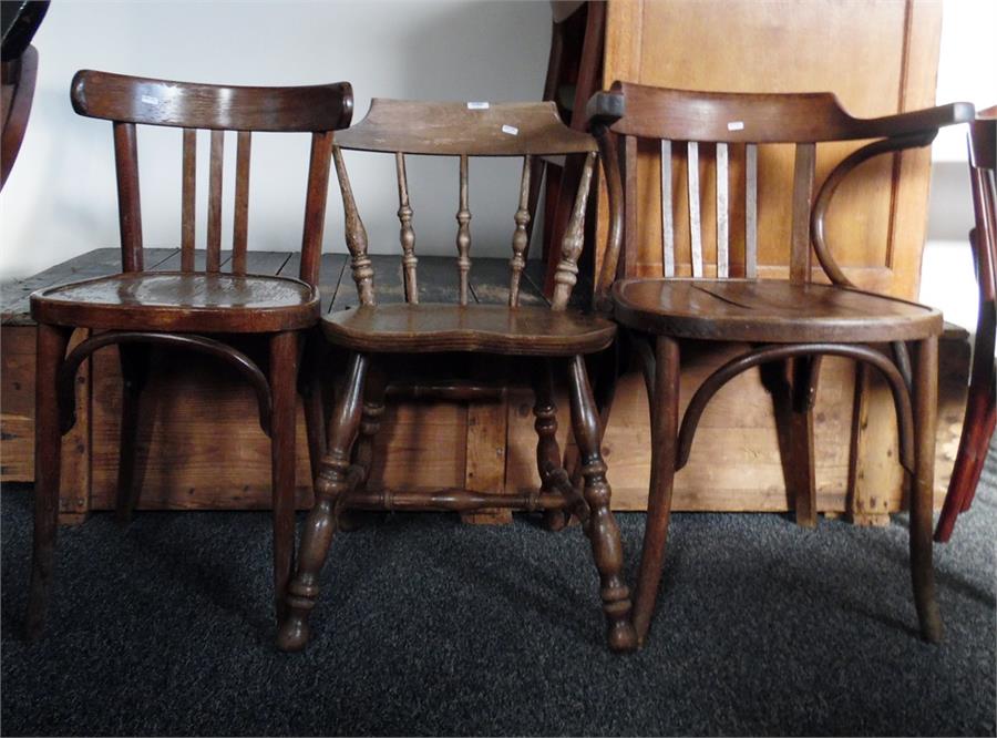 Bentwood low armchair with solid seat, a Bentwood single chair and a spindle back chair (3)