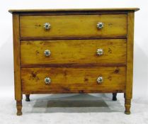 Late 19th/early 20th century pine chest of three drawers, each with ceramic knob handles, 91cm wide