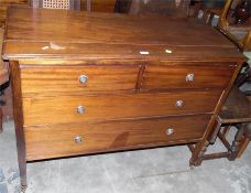 Mahogany chest of two short and two long drawers, on square tapering legs, with castors, width 107cm