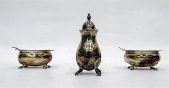 Similar three-piece silver cruet set comprising of two silver salts with blue glass liners and a