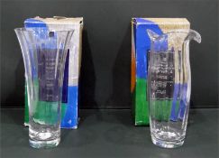 Two Dartington vases, 36cm high (unused), with boxes