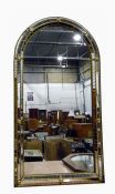 Modern arched mantel mirror with dome-shaped mirrored frame and gilt mounts, 58cm wide