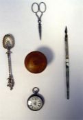 Silver fob watch with enamel dial, pair of scissors, a silver-coloured spoon with figure finial with