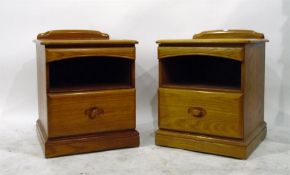 Pair of varnished pine bedside cabinets
