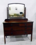 Early 20th century mahogany mirror-back dressing chest with two short and two long drawers, on