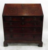 Early 19th century oak bureau, the fall revealing