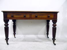 Mid 19th century mahogany side table fitted two drawers to frieze, each with turned knob handles, on