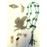 Quantity of costume jewellery to include brooches, beaded necklaces, earrings, etc (1 box)