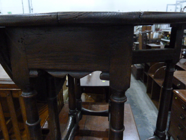 Late 18th century oak oval fall-flap gateleg table having Spanish style feet, 68cm wide - Image 4 of 8