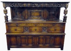 Early 19th century oak reproduction court cupboard, having carved guilloche style canopy, with