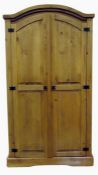 Unpolished pine wardrobe with dome top and panelled doors, plinth base, 102cm wide