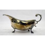 Silver sauce jug with gadrooned border, on cabriole-shaped feet, Birmingham maker's mark 'B&Co',
