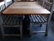 Oak draw-leaf dining table on turned bulbous supports united by central stretcher, length extended