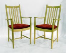 Pair of modern beech railback elbow chairs with pad seats