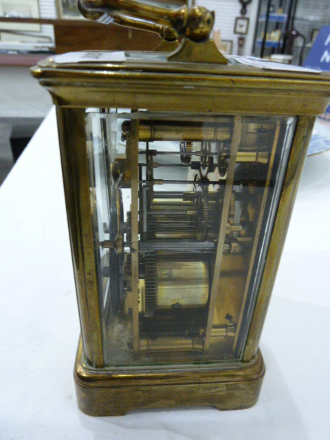 Brass carriage clock in corniche case, with striking movement, 18cm high over the handle - Image 6 of 7