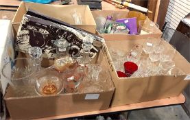 Assorted glassware including wines, glass punch cups, glass salad dishes, decanters, claret jug with