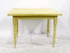 Yellow painted kitchen table on turned supports, 106cm wide