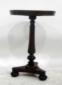 Victorian rosewood circular topped occasional table with reeded pedestal on triform base, 50cm