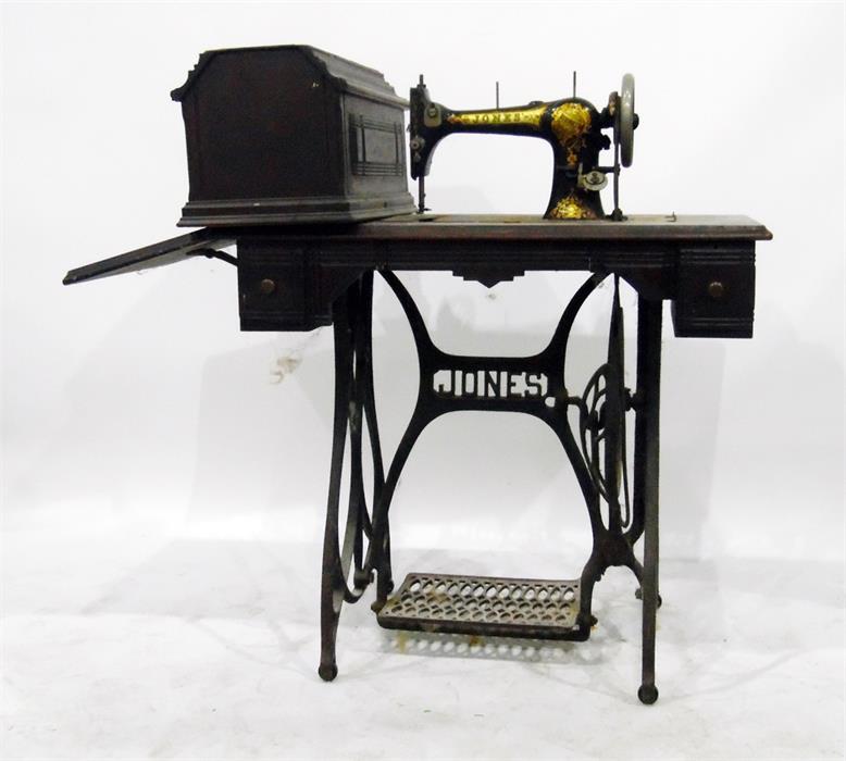 Treadle sewing machine by Jones