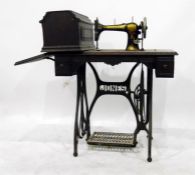 Treadle sewing machine by Jones