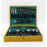 Oak cased canteen of cutlery with hardwood handles
