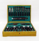 Oak cased canteen of cutlery with hardwood handles