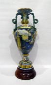 Large majolica two-handled urn with mask and serpe