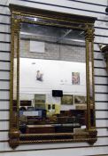 Regency style multi-panelled wall mirror in ornate gilt