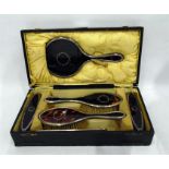 Silver mounted faux tortoiseshell dressing table set to comprise pair brushes, pair clothes brushes,