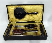 Silver mounted faux tortoiseshell dressing table set to comprise pair brushes, pair clothes brushes,