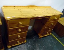 Modern pine twin pedestal dressing table with four short drawers either side of kneehole, raised