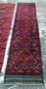 Meshwani wool runner, red ground, five lozenges to centre, 255cm x 60cm