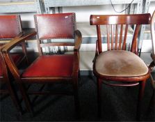 Three beech carver chairs with studded upholstered backs and seats and a pair of splatback chairs