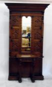 19th century oak hall stand with carved and mirrored back, metal hooks, frieze drawer and umbrella