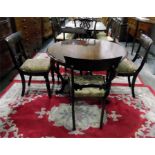 Georgian style mahogany circular top dining table with moulded edge, stamped by 'John Taylor & Co,