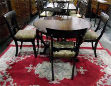 Georgian style mahogany circular top dining table with moulded edge, stamped by 'John Taylor & Co,