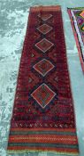 Meshwani wool runner, red ground, blue and cream decoration, 256cm x 67cm