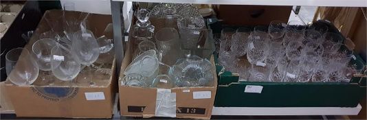 Large quantity of cut glass and other glassware including decanters, avocado dishes, brandy