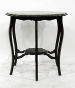 Edwardian mahogany shaped circular occasional table on shaped supports united by a moulded under-