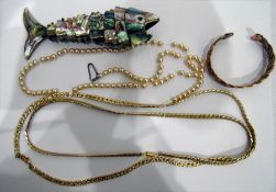 Quantity of costume jewellery to include brooches,