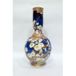 Japanese gourd-shaped pottery vase, blue ground wi