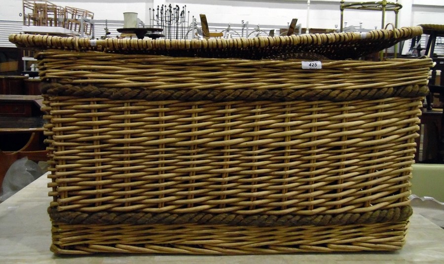 Large laundry basket with other baskets