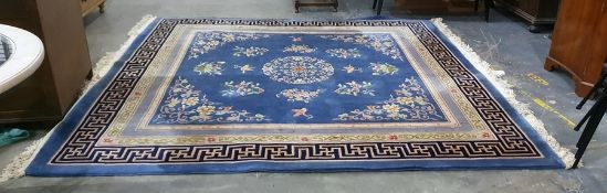 Chinese superwash carpet having blue ground, centr