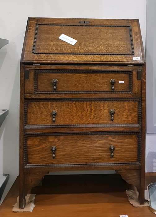 20th century oak bureau, the fall front enclosing