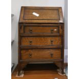 20th century oak bureau, the fall front enclosing