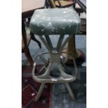 Metal framed paint splattered stool