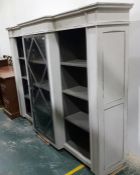 Grain painted breakfront bookcase with steel and g