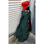Various Mazina golf clubs within a golf carry bag