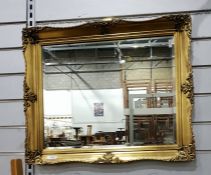 Rectangular bevelled plate wall mirror in gilt mou