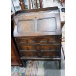 Circa 1920's oak bureau with geometric panelled dr